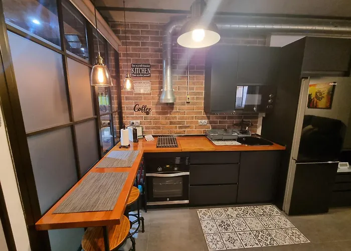 Estudio Pizarro Down Town Apartman