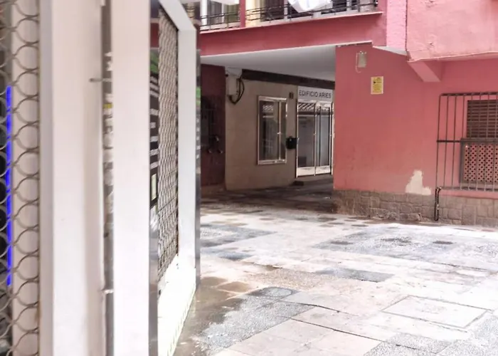 Estudio Pizarro Down Town Apartman