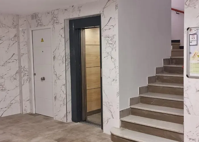 Estudio Pizarro Down Town Apartman