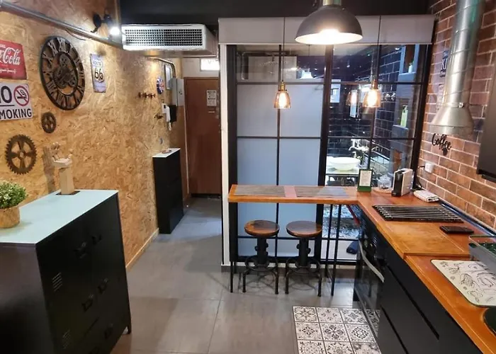 Estudio Pizarro Down Town Apartman