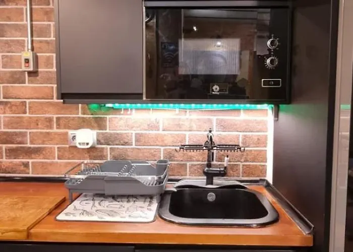 Estudio Pizarro Down Town Apartman